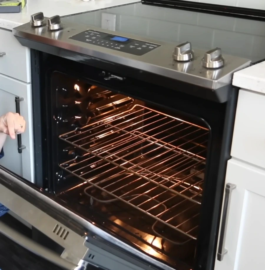 Appliance repair technician Abilene TX Appliance repair technician servicing oven Abilene TX